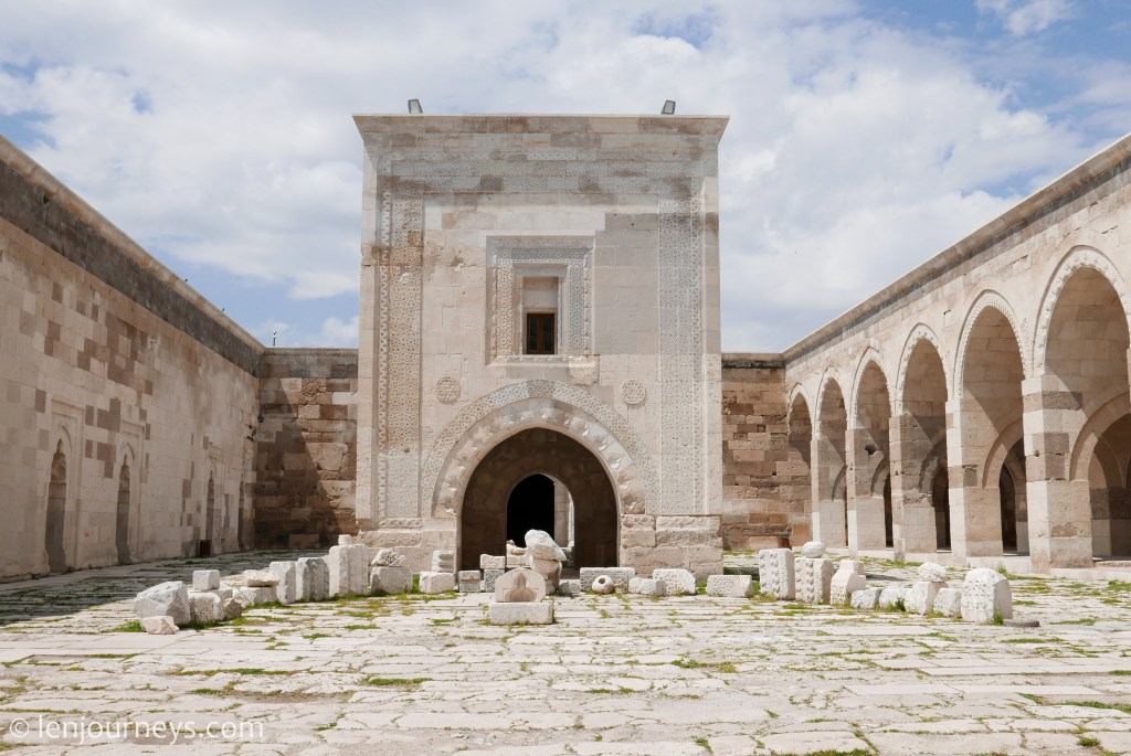 The open courtyard of Sultan Han with the kiosk mosque standing in the middle.