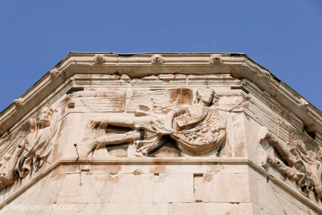 Intricate carvings on the Tower of Wind