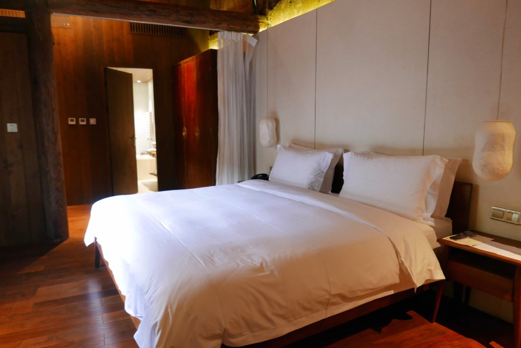 Bedroom at Tsingpu Nanjing Tulou Retreat