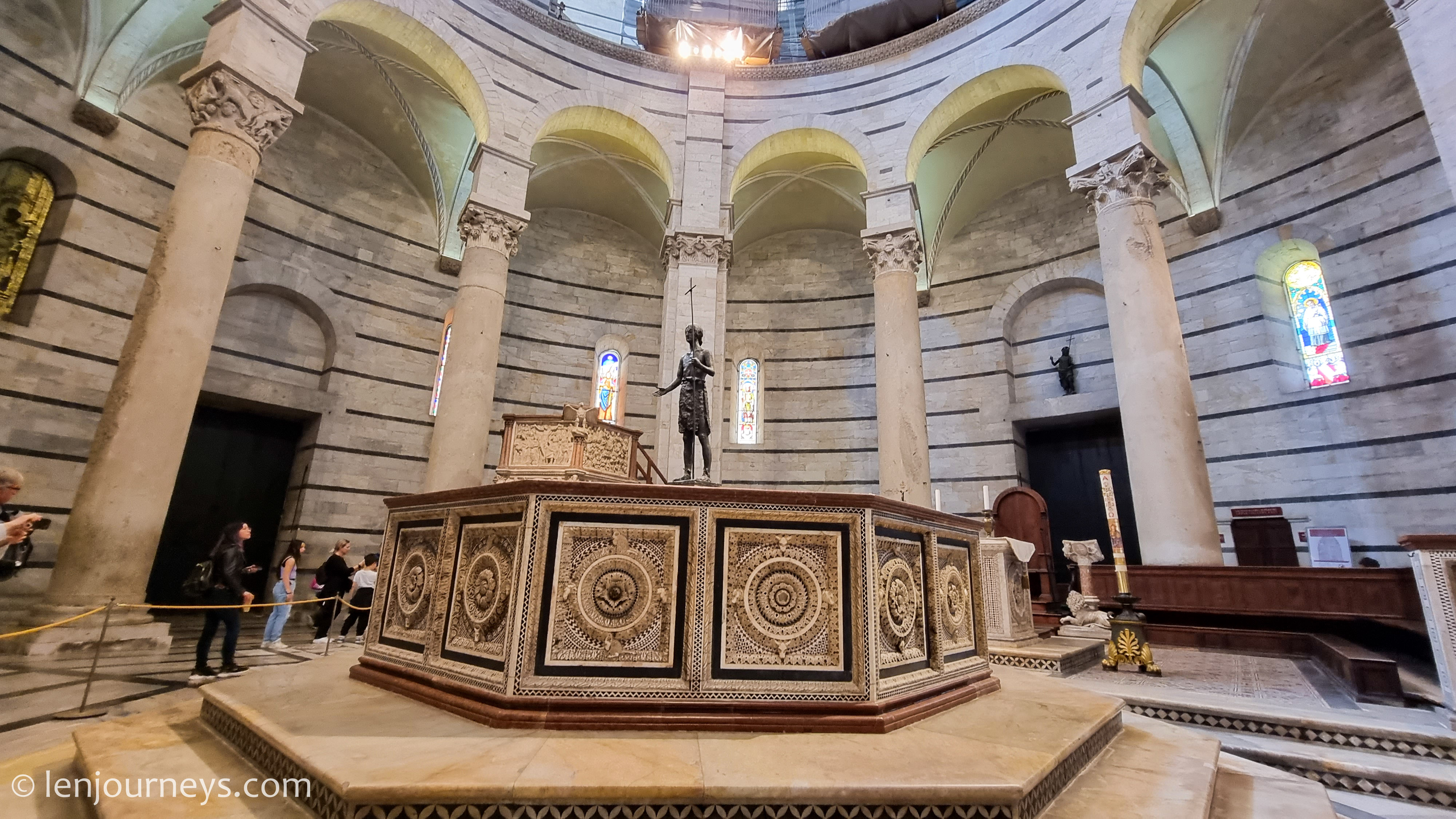 The marble baptismal font in Pisa