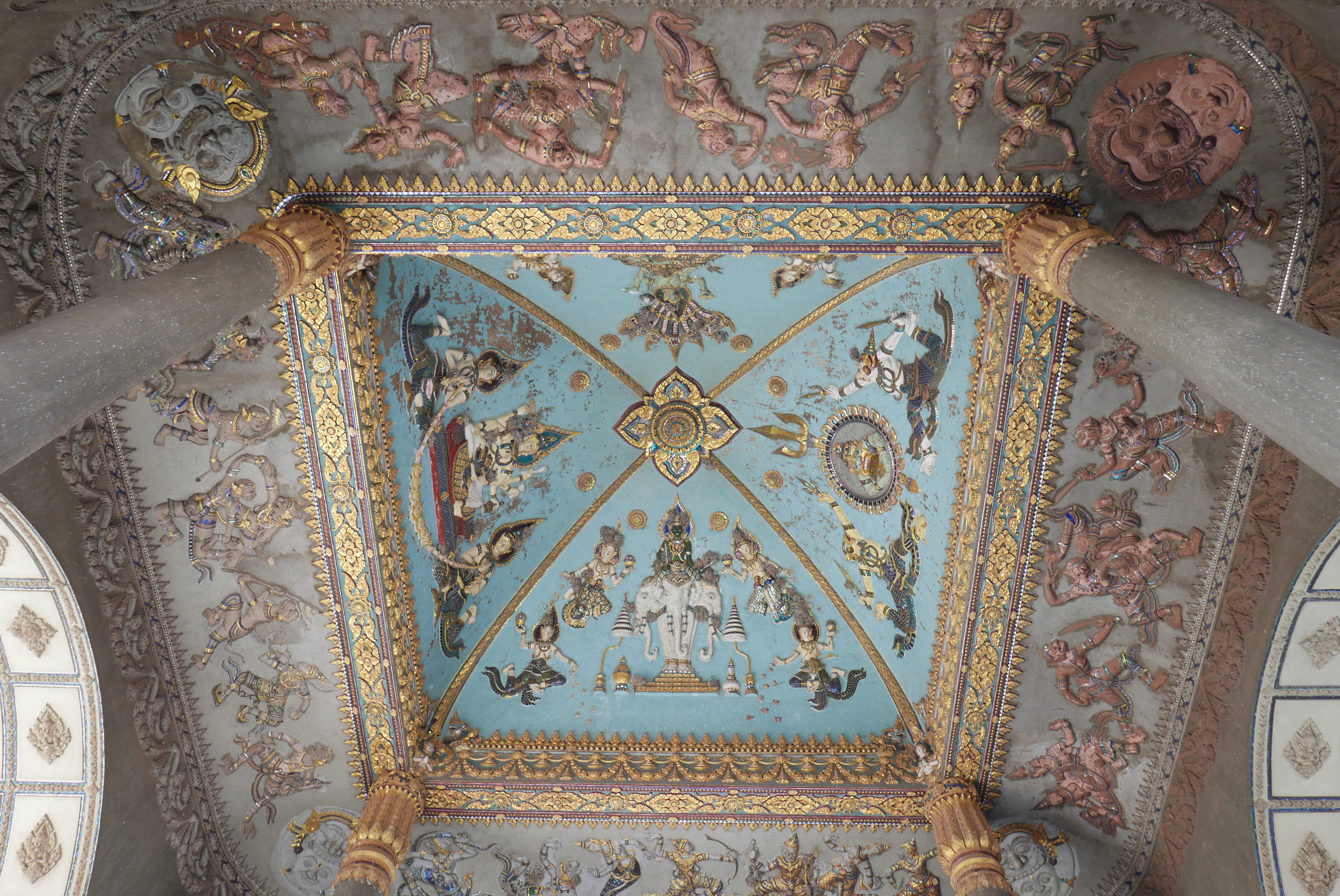 The richly decorated ceiling of Patuxai